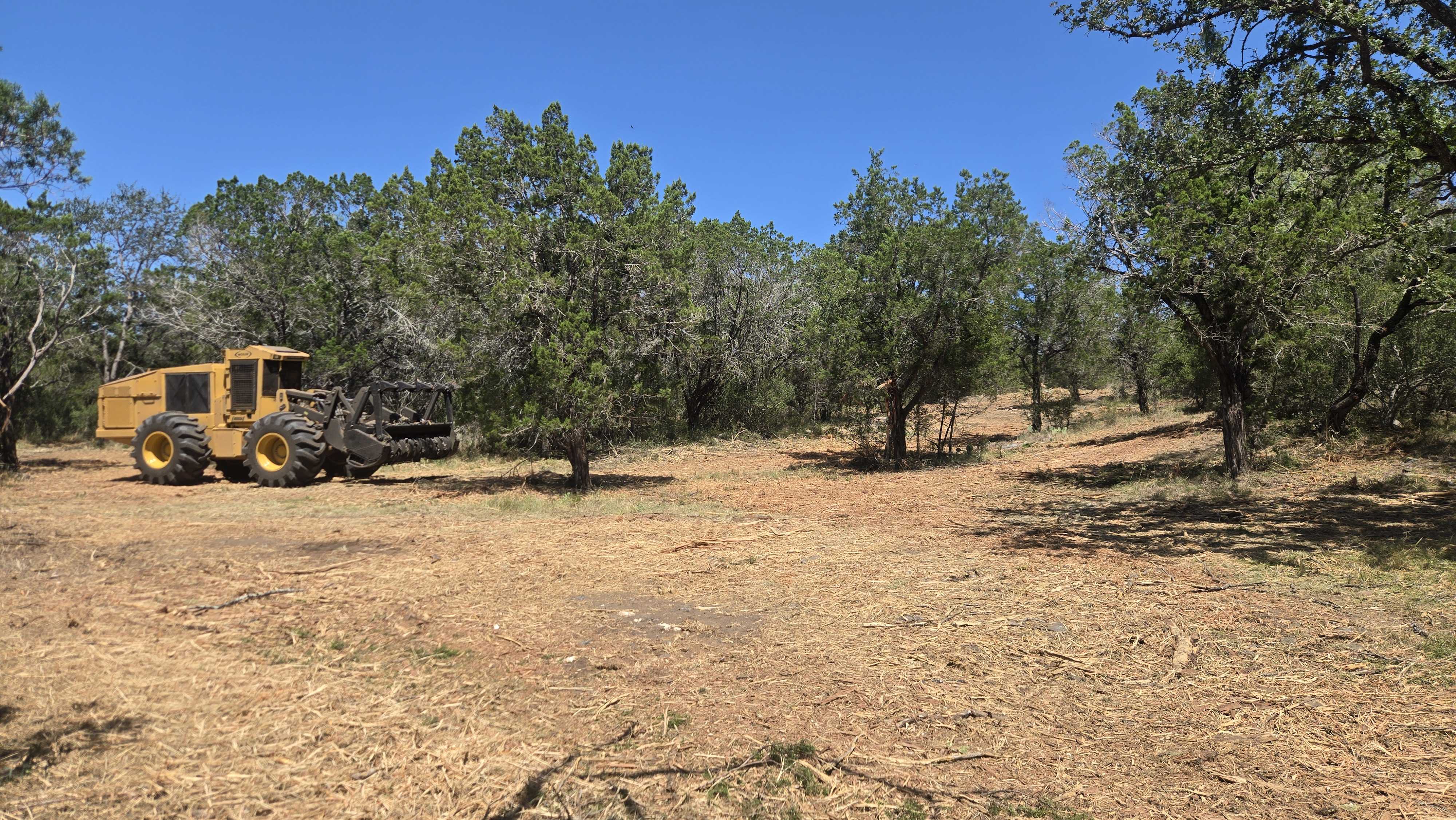 Cleared and widened ranch trail with oaks preserved on 5 acres in Llano Texas