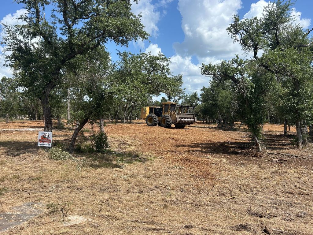 Clean ground after pile mulching near Luling TX