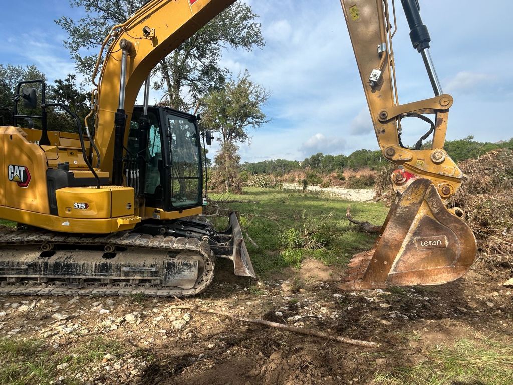 Flood damaged ground before cleanup near Taylor TX