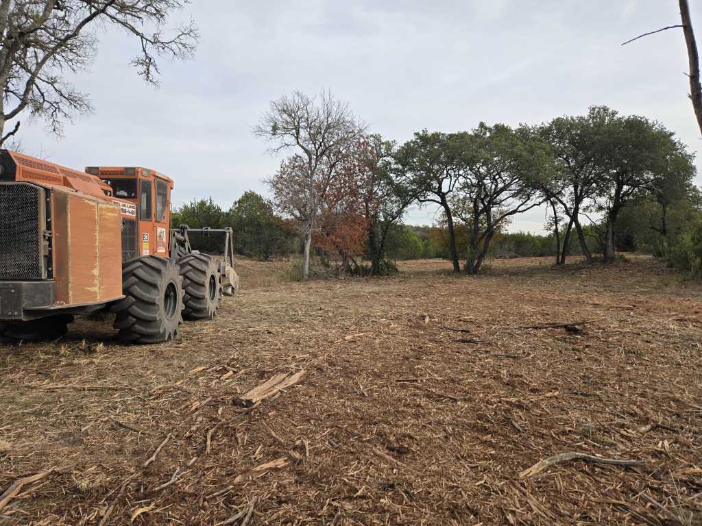 Forestry mulching equipment on cleared ground near Burnet TX