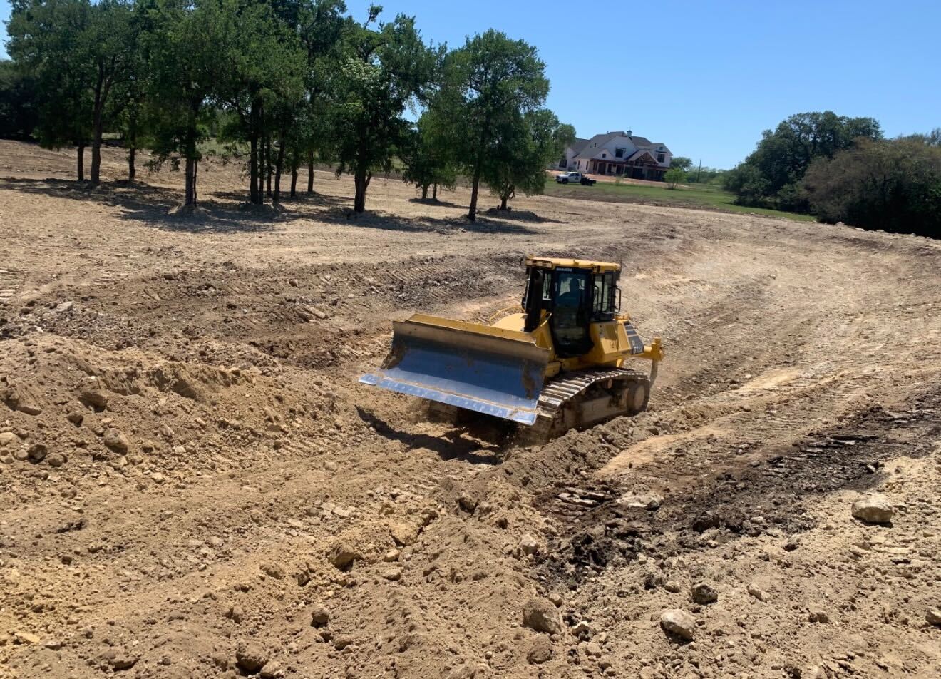 Half acre pond build near Lampasas Texas