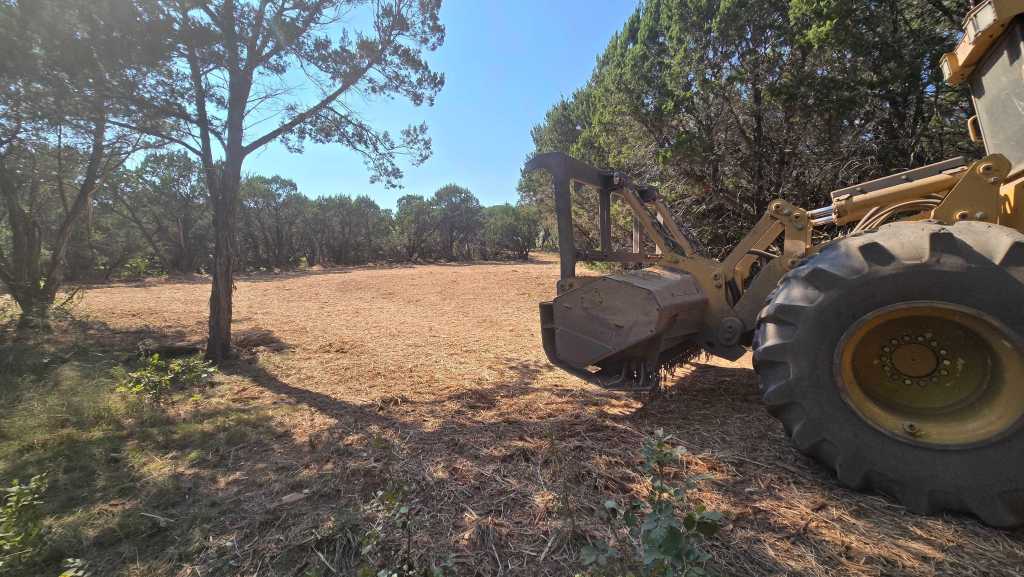 Forestry mulcher working through cedar near Granbury TX