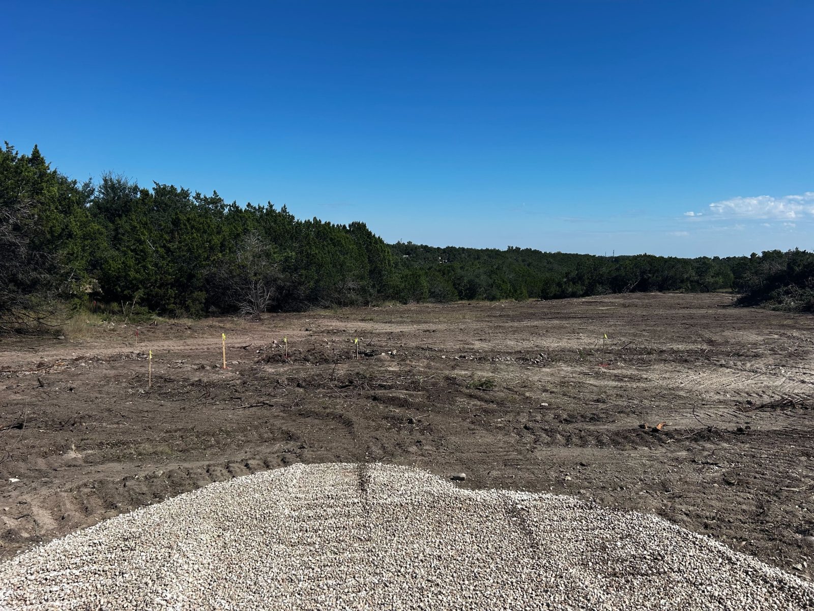 Open graded ground after clearing on an Austin area site