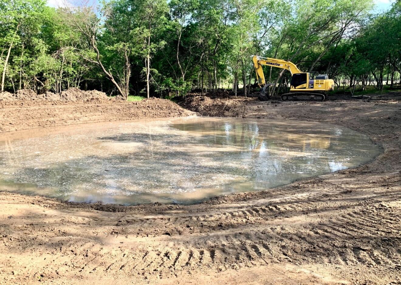 Quarter acre pond built in 2 days near Bastrop Texas
